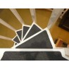 Self-adhesive mats for spiral stairs